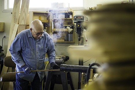 &lt;p&gt;Kent Setty, of Coeur d'Alene, removes bands of wood from his shop steamer Tuesday prior to shaping the pieces to a mold. Setty uses his wood shop to make custom fishing nets.&lt;/p&gt;