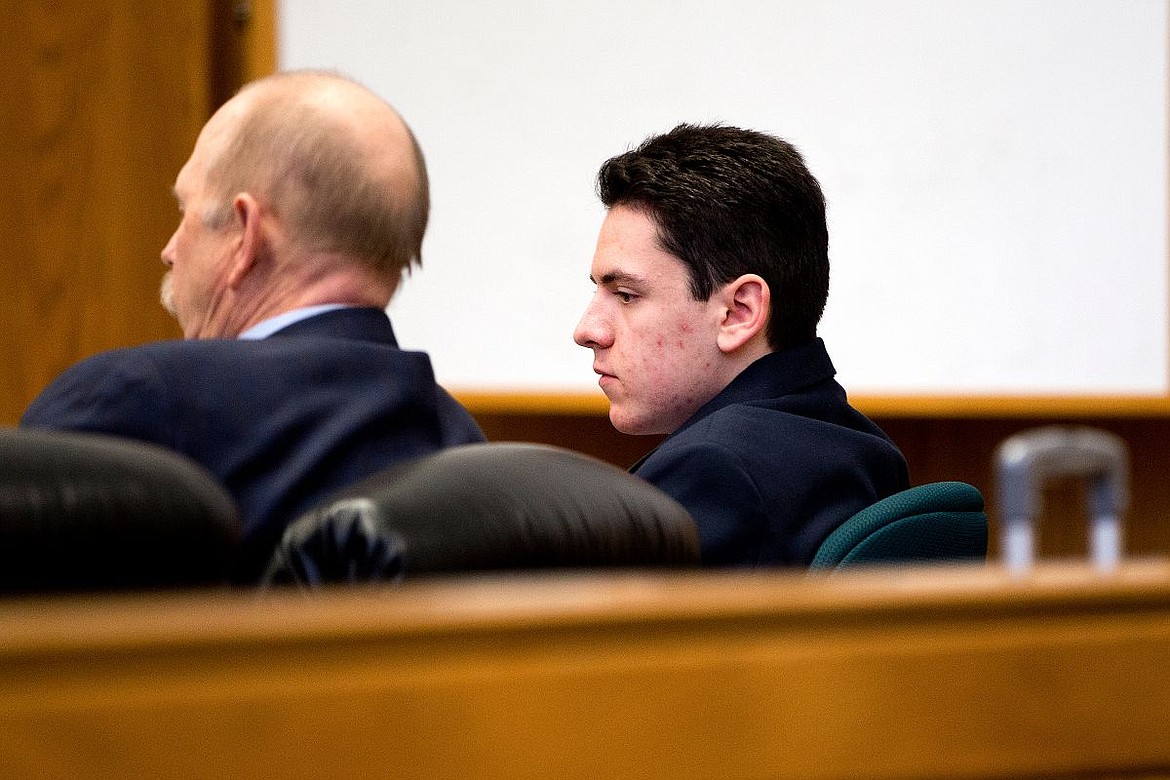 &lt;p&gt;&#160;Eldon Gale Samuel III sits beside&#160;Kootenai County Public Defender John Adams during&#160;Samuel's sentencing hearing on Monday at the Kootenai County Courthouse. Samuel III, 16, was sentenced to 20 years in state prison with the possibility of parole after 20 years for the murders his father and younger brother.&lt;/p&gt;