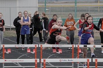 &lt;p&gt;Stephanie Lewandowski leaps over her first 100-meter hurdle last week in Ronan.&lt;/p&gt;