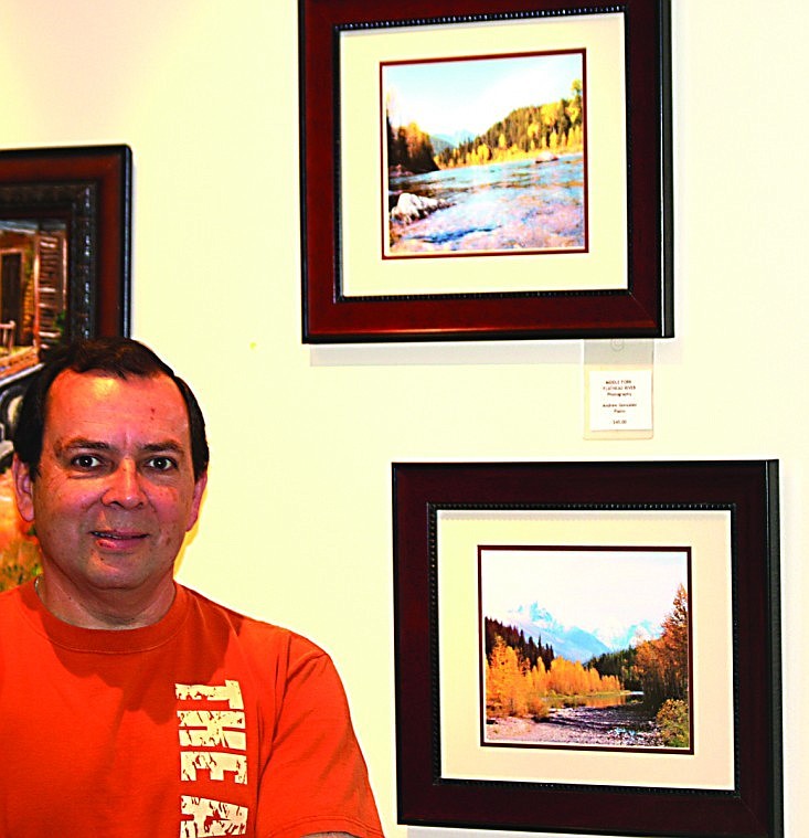&lt;p&gt;Andrew Gonzalez next to two of the eight photographs he has on display for &quot;Art on the Walls&quot; at the Clark Fork Valley Hospital.&lt;/p&gt;