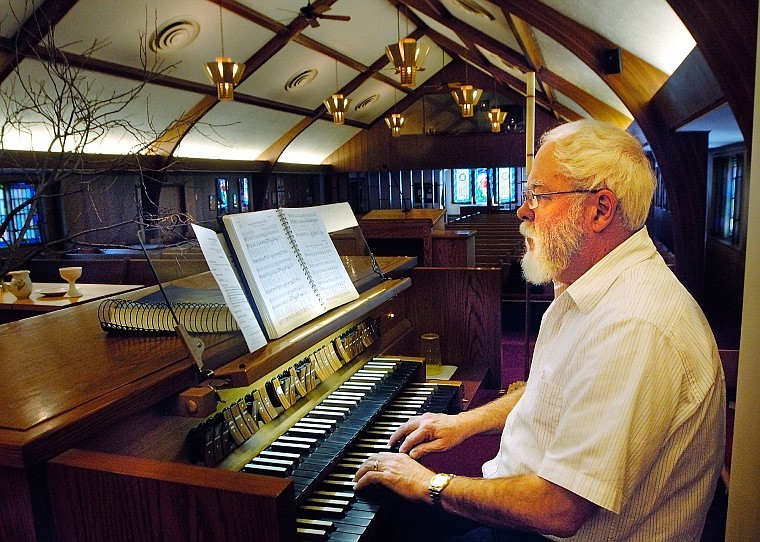 Kalispell First Presbyterian Church Organist Lee Scifers practices songs for Easter Sunday in the sanctuary of the church Wednesday morning. Scifers has been the church organist for 18 years, but began his career with the organ when he was a sophomore in high school growing up in Eastern Montana.