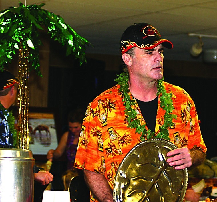 &lt;p&gt;A member of the Plains Volunteer Fire Department looking for more guests to serve at the Fireman's Ball on March 31 at the Plains VFW.&lt;/p&gt;