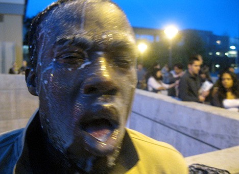 &lt;p&gt;In this photo provided by David Steinman, Nnaemeka Alozie, campaign manager for Steinman, reacts with milk on his face after being sprayed with pepper spray during a protest on Tuesday, April 3, 2012, in Santa Monica, Calif. Campus police pepper-sprayed as many as 30 demonstrators after Santa Monica College students angry over a plan to offer high-priced courses tried to push their way into a trustees meeting Tuesday evening, authorities said. (AP Photo/Courtesy David Steinman)&lt;/p&gt;