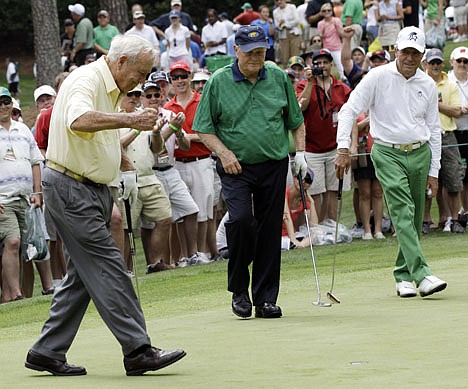 &lt;p&gt;Gary Player, right, and Jack Nicklaus watch as Arnold Palmer celebrates a putt on the second hole during the par 3 competition at the Masters golf tournament Wednesday, April 4, 2012, in Augusta, Ga. (AP Photo/David J. Phillip)&lt;/p&gt;