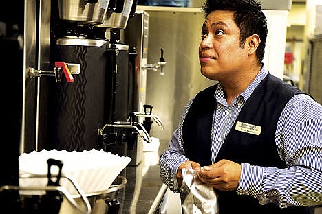 &lt;p&gt;Brent Reuer prepares coffee for guests at the Coeur d&#148;Alene Resort on Wednesday. Reuer recently returned from a Guatemala trip where he interacted with less fortunate kids and took part in activities such as playing soccer, and helping them read books.&lt;/p&gt;