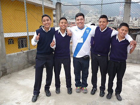 &lt;p&gt;Brent Reuer stands with students from the Minerva Cooperative School in Quetzaltenango, Guatemala, during his trip to deliver school supplies to schoolchildren in February. Reuer was kidnapped as an infant during the Guatemalan Civil War, spent much of his childhood in an orphanage and was adopted by a couple in Sandpoint. This was his first time returning to his native country since his adoption.&#160;&lt;/p&gt;