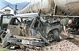 Mission man survives after truck hit by train