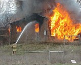 Old homes burned in St. Ignatius