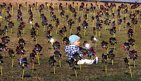 &lt;p&gt;Finn Davis, 1, of Scranton, Pa. poses for pictures while surrounded by 1,107 pinwheels at Lackawanna County Courthouse Square in downtown Scranton, Pennsylvania on Friday. April is National Child Abuse Prevention Month and each pinwheel represents a child helped by the Children's Advocacy Center in 2012.&lt;/p&gt;