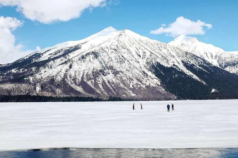 &lt;p&gt;Tourists walk on the frozen Lake McDonald Tuesday afternoon in Glacier National Park. April 1, 2014 in Glacier, Montana. (Patrick Cote/Daily Inter Lake)&lt;/p&gt;