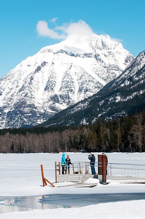 &lt;p&gt;Visitors take pictures near Lake McDonald Tuesday afternoon in Glacier National Park. Snowpack is well above average in the high country.&lt;/p&gt;