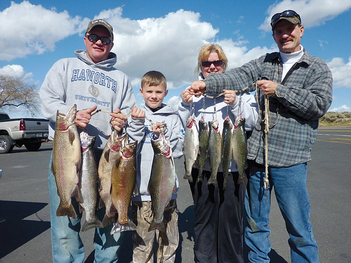 Troy, Holden, Norman and Darla Haworth of Warden experienced seep lake trout fishing; as good as it gets!