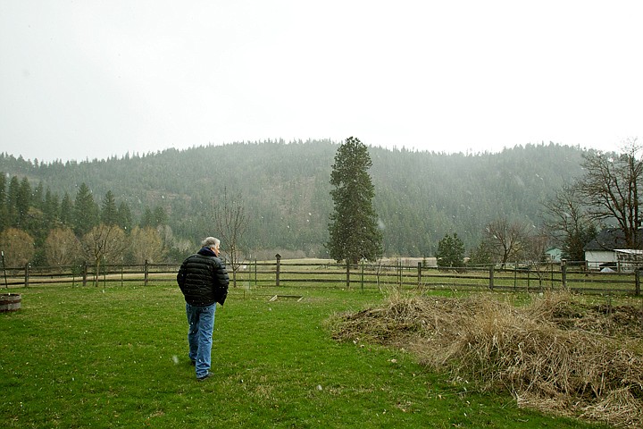 &lt;p&gt;Jeff Coulter's backyard faces the north side of Best Hill where a proposed development plan prompted a protest from neighbors in the Nettleton Estates subdivision.&lt;/p&gt;