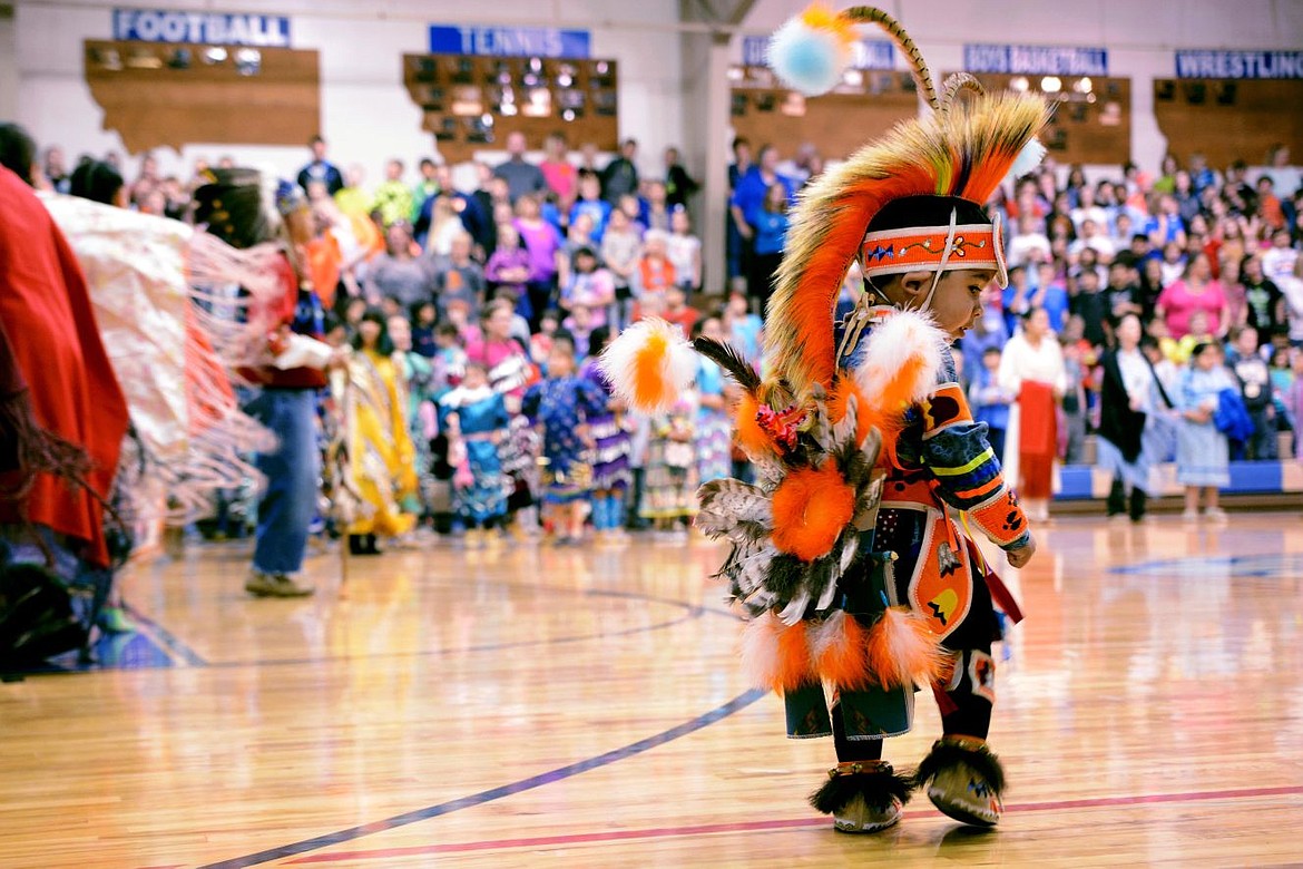 &lt;p&gt;Mica Gardipee, 2, dances to the Inner Tribal dance that started off the powwow on Friday at Mission Bull Dog's gymnasium.&lt;/p&gt;