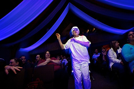 &lt;p&gt;Marco Romero, 12, dances at Heart of the City church in Coeur d'Alene during a flash mob Friday for the congregation.&lt;/p&gt;