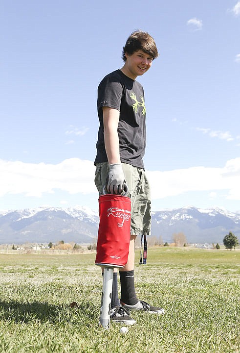 &lt;p&gt;Chance Deneault picks up balls on the driving range.&lt;/p&gt;