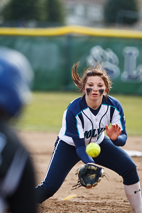<p>Lake City's pitcher Casey Stangel fields the ball after a first inning hit by Coeur d'Alene.</p>