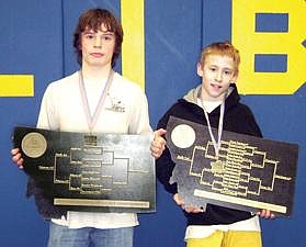 Courtesy Photo Two of the three state champions from Libby were available for a photo with their brackets in hand, Mitch Haugen, left, and Zach Crace. Not pictured is Eric Thrift. For a photo of other wrestlers, go online to thewesternnews.com and click on &quot;Photos&quot; for the photo galleries. Various action photos from state are also posted online.