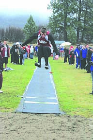 Todd Mrystol competes in the long jump. It was one of the few events to be held at Saturday's meet.