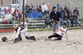 Plains-Hot Springs junior Karlena Heward slides into home during a 1-2 loss in the first half of a double header versus Florence on Friday. The game, originally scheduled for Thursday was postponed due to poor weather conditions.