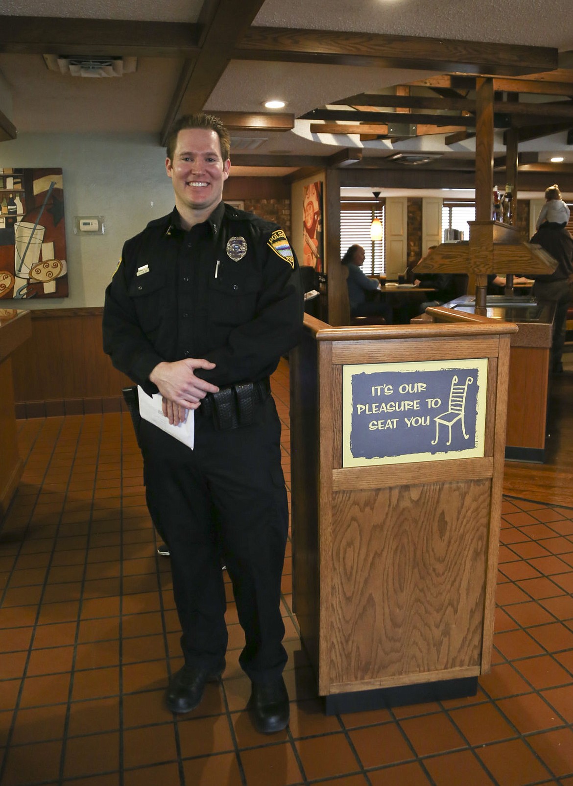 &lt;p&gt;Quintin Fowler stands at the entrance of Pizza Hut to welcome any new customers into the business.&lt;/p&gt;