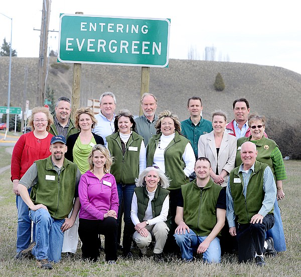 <p><strong>In early April,</strong> Evergreen Chamber of Commerce directors and ambassadors gathered at one of the four new signs designating the boundaries of Evergreen. Front row, from left, are Duane Dierenfield, Darla Harmon, Mary MCracken, Jeff Erickson and Ted Luehr; middle row: County Commissioner Pam Holmquist, Amanda Beech, Ronda Gress, Angie Meehan, Susan Witte and Bev Ferris; back row: Rod Leese, TJ Wendt, BJ Lupton, Chuck Eble and Craig Witte. The signs were among the major accomplishments of the Evergreen Chamber during its inaugural year. (Brenda Ahearn file photo/Daily Inter Lake)</p><div> </div>