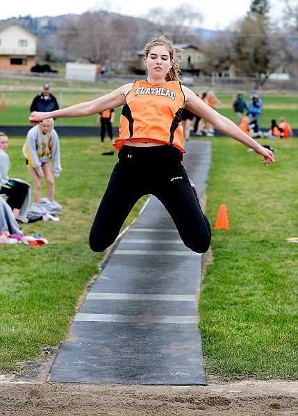 <p class="p1">Flathead’s Kwyn Johnson heads for the pit in the triple jump on Saturday in a track dual with Great Falls C.M. Russell at Legends Stadium. Johnson took first place with a distance of 37 feet, 8 1/2 inches. (Brenda Ahearn/Daily Inter Lake)</p>