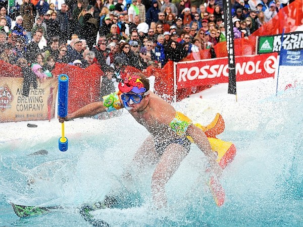 Brandon Kelman begins to lose some speed and begins to sink down into the pond water.