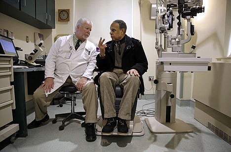 &lt;p&gt;In this March 12 photo, optometrist Paul Archambault, left, talks with U.S. Army veteran Kenneth Chavis during a glaucoma examination at the Fayetteville Veterans Affairs Medical Center in Fayetteville, N.C.&lt;/p&gt;