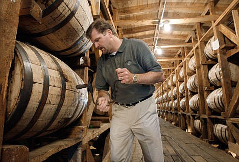 &lt;p&gt;Jeff Arnett, the master distiller at the Jack Daniel Distillery in Lynchburg, Tenn., drills a hole in a barrel of whiskey in one of the aging houses at the distillery on May 20, 2009.&lt;/p&gt;