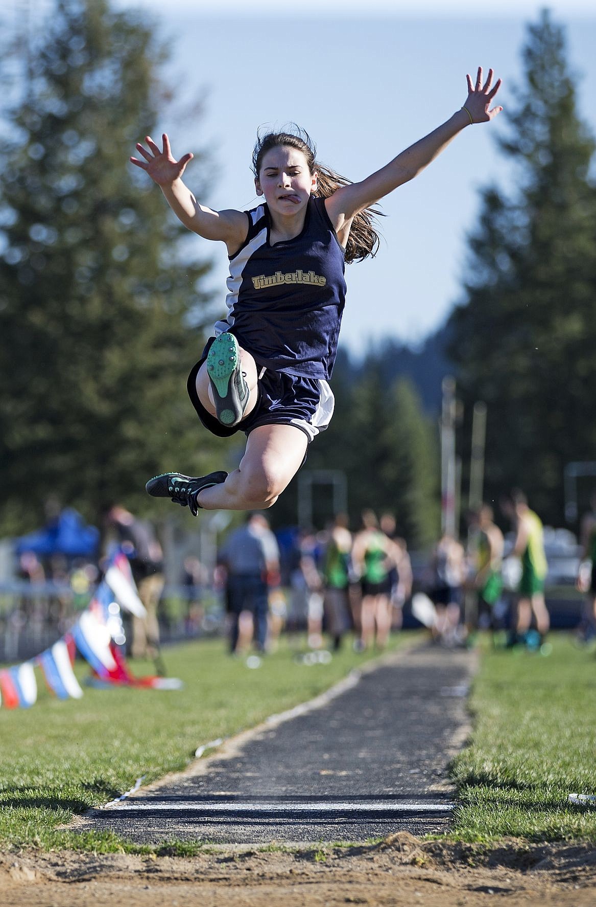 &lt;p&gt;LOREN BENOIT/Press Clair Neelon, of Timberlake High School, leaps with a distance of 13 feet 3/4 inches during the Kootenai County Challenge held at Timberlake High School.&lt;/p&gt;