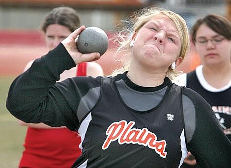 Photo by Ed Moreth Plains Trotter Tia Thompson heaves the shot put for 22 feet, 8 inches at the Plains Junior High Invitational Track Meet. Thompson finished second place in the girls B competition with a throw of 24 feet, 11 inches.