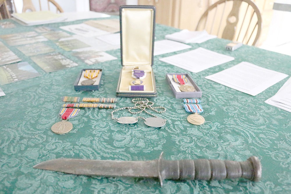 &lt;p&gt;The knife pictured here in front of Norris Grunhuvd's Purple Heart survived his ordeal intact.&lt;/p&gt;