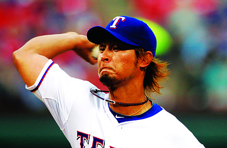 &lt;p&gt;Texas Rangers' Yu Darvish (11) of Japan delivers to the Seattle Mariners in the first inning of a baseball game Monday, April 9, 2012, in Arlington, Texas. (AP Photo/Tony Gutierrez)&lt;/p&gt;