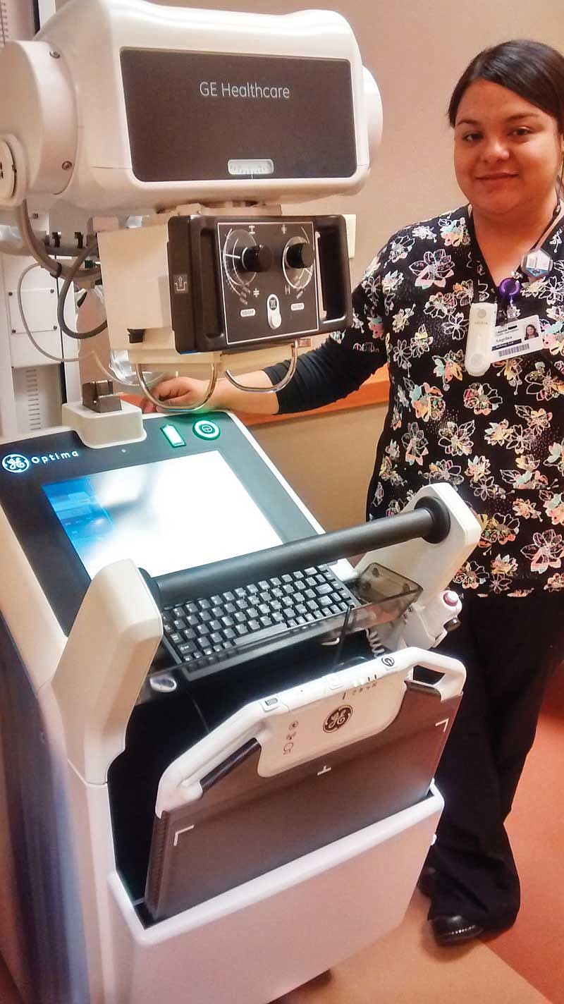 Radiology Technologist Angie Rodriguez and her portable x-ray machine.