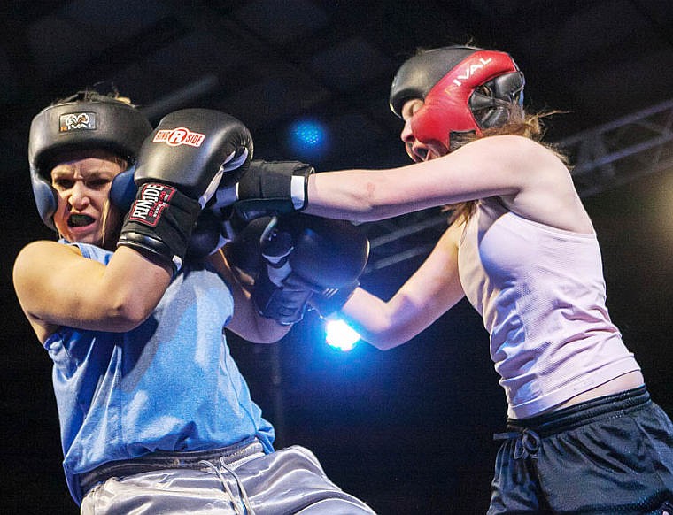 &lt;p&gt;Flathead&#146;s Ashlie Wise (right) lands a punch on Columbia Falls&#146; Krystan Jones Thursday night during the fifth annual Crosstown Smoker at the Flathead County Fairgrounds Trade Center. Wise won by unanimous decision. (Patrick Cote/Daily Inter Lake)&lt;/p&gt;