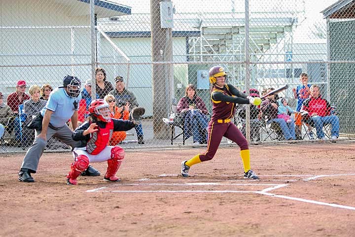 Briana Valdez fouls off a pitch in the first inning against Sunnyside Tuesday at Larson Field. The Chiefs beat the Grizzlies 17-1 to move into a first place tie with Eastmont.