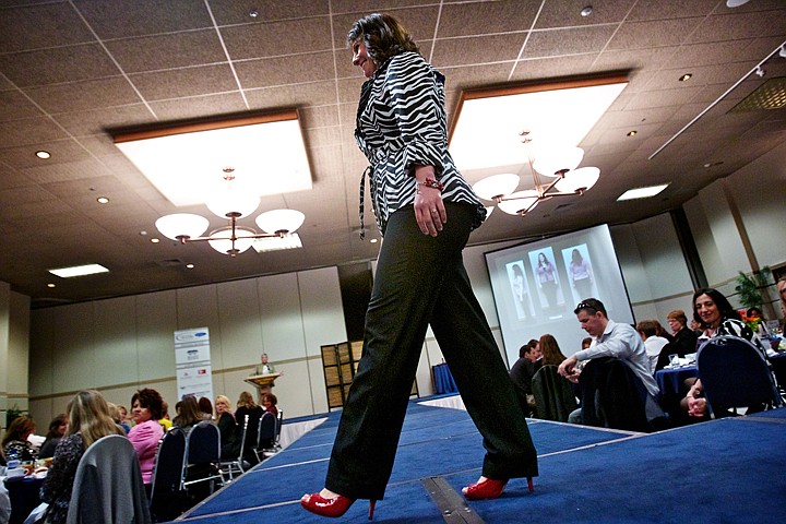 &lt;p&gt;JEROME A. POLLOS/Press Rebecca Welsh struts on the catwalk for the crowd in her red high-heeled shoes&lt;/p&gt;