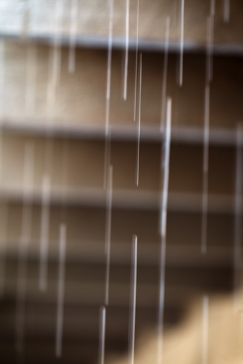 &lt;p&gt;SHAWN GUST/Press Water pours off of a parking structure roof in Coeur d'Alene as Wednesday's snow fall melts in the mid-day sun.&lt;/p&gt;