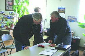 Jim Schultz talks with Imperial Oil representative Harry Lillo about the route they intend to take and could have taken.