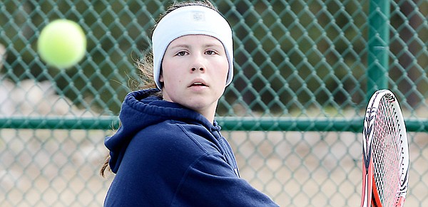 &lt;p&gt;Glacier's Katya Kulikova eyes the ball in her No. 1 singles match against Flathead&#146;s Barrie Sugarman in the crosstown tennis dual at Flathead Valley Community College on Thursday.&lt;/p&gt;