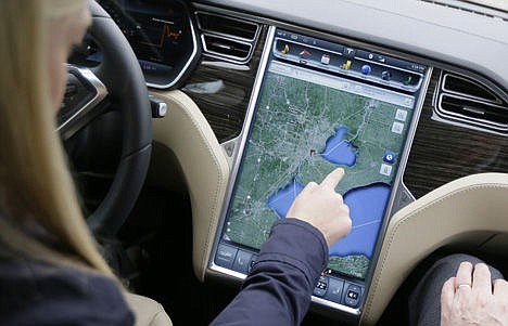 &lt;p&gt;Alexis Georgeson of Tesla Motors shows off the navigation screen during test drive of the new Tesla Model S 70-D electric car in Detroit on April 7.&#160;&lt;/p&gt;