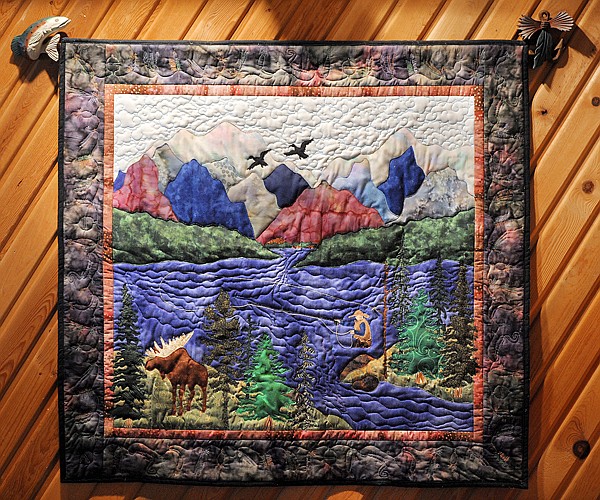 One of Collard&#146;s decorative quilts adorns a wall at Smoky Bear Ranch.