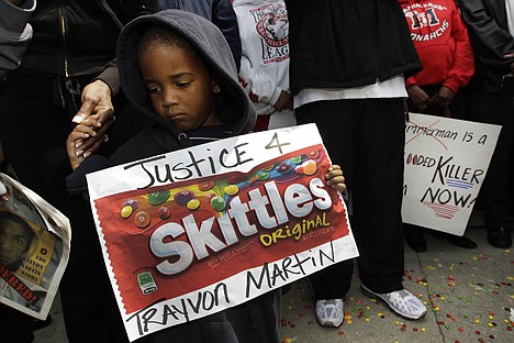 &lt;p&gt;FILE - In this March 27, 2012 file photo, Steven Jonhson, 3, holds an enlarged banner of &quot;Skittles&quot; candy, as he joins Los Angeles community members at a &quot;Justice for Trayvon Martin hoodie rally&quot; in honor of Trayvon Martin, the unarmed black teenager who was wearing a hoodie on the night when he was shot and killed by a neighborhood watch captain George Zimmerman. Skittles isn't the first popular food brand to find itself at the center of a major controversy. The terms 'the Twinkie defense' and 'don't drink the Kool-Aid' became part of the vernacular decades ago in the wake of tragic events. More recently, Doritos made headlines when it was reported that the corn chips were Saddam Hussein's favorite snack.&lt;/p&gt;