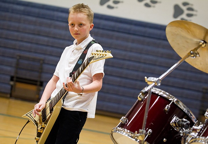 &lt;p&gt;SHAWN GUST/Press Caden Davis, a fifth-grader at Winton Elementary, jams the Michael Jackson hit &quot;Beat It&quot; on his flying-v guitar during Julie Johnson Jamboree.&lt;/p&gt;