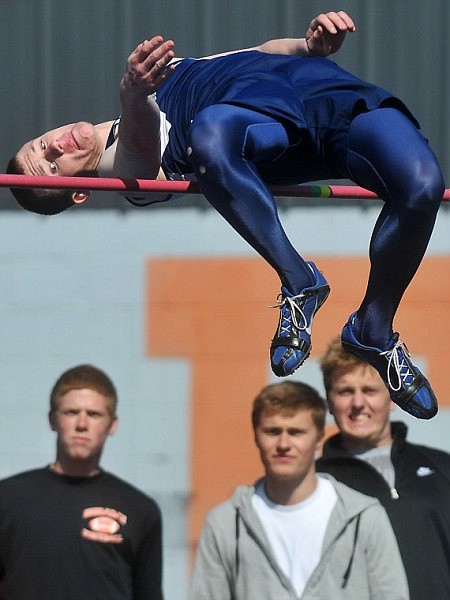 Glacier's Shane Freese keeps his eye on the bar as he attempts to clear it on Tuesday afternoon. Freese took first place with a high jump of 6'8".