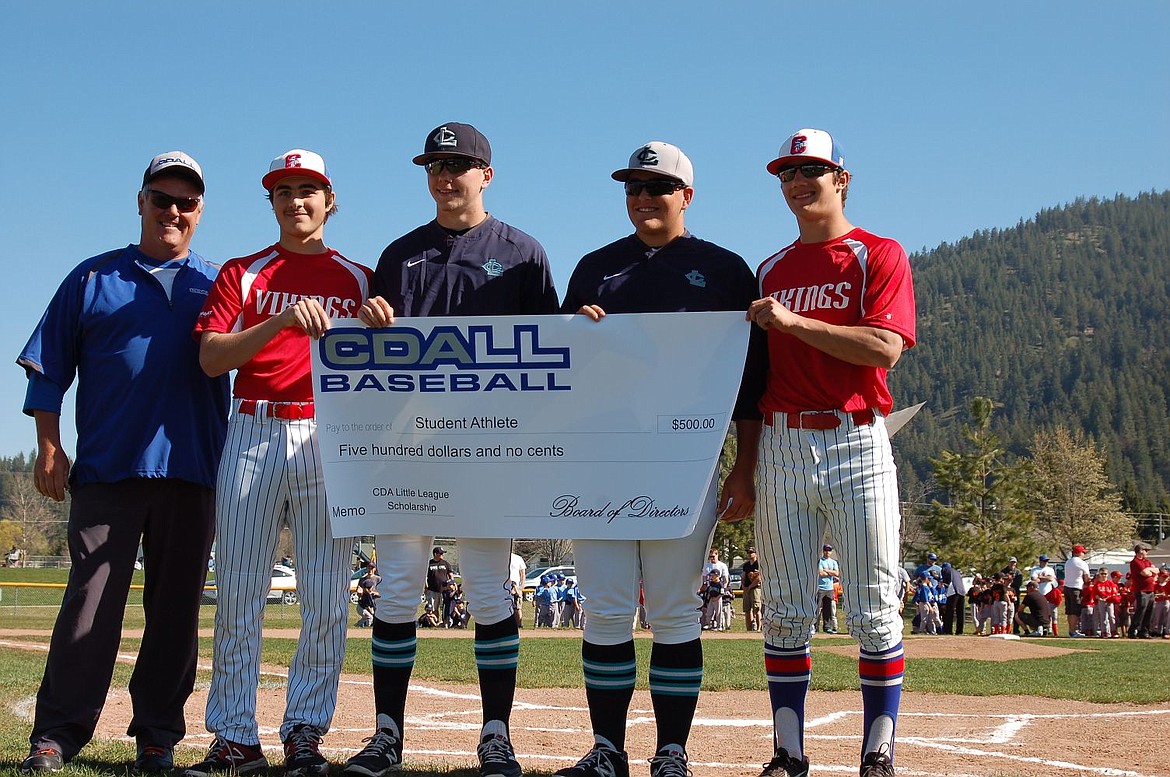 &lt;p&gt;Courtesy photo&lt;/p&gt;&lt;p&gt;Coeur d Alene Little League held its opening day ceremonies Saturday at the Canfield Sports Complex. All 28 teams for the coming season were in attendance. Along with honoring the current board of directors for their service to the league Coeur d'Alene Little League presented four $500 scholarships to local student athletes that participated in Coeur d Alene Little League in the past and have continued to demonstrate leadership on the field as well in the classroom. From left are Jeffrey Smith, Coeur d'Alene Little League president, and scholarship recipients Brendan Delgado of Coeur d Alene High, Cody Garza of Lake City High, Dominic Conigliaro of Lake City and Nathaniel English of Coeur d Alene.&lt;/p&gt;