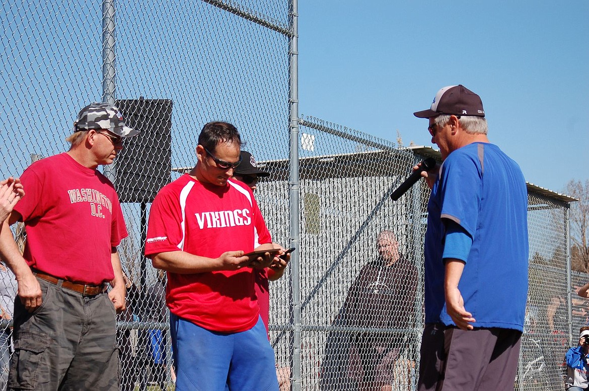 &lt;p&gt;Courtesy photo&lt;/p&gt;&lt;p&gt;Coeur d Alene Little League dedicated a new tree to the Canfield Sports Complex on Saturday during its opening day ceremonies. The red oak was planted in memory of Reggie Nault, a past Coeur d'Alene Little League player and all-star who passed away this past summer. An engraved plaque was presented to Andy Nault, Reggie's father, and will be placed next to the tree as a permanent memorial&lt;/p&gt;
