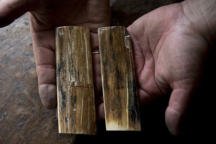 &lt;p&gt;Some knife handles are made of mammoth bark ivory that is more than 10,000 years old. Here, two pieces of the ivory is shaped and finished, ready to be cut and placed onto a knife.&lt;/p&gt;