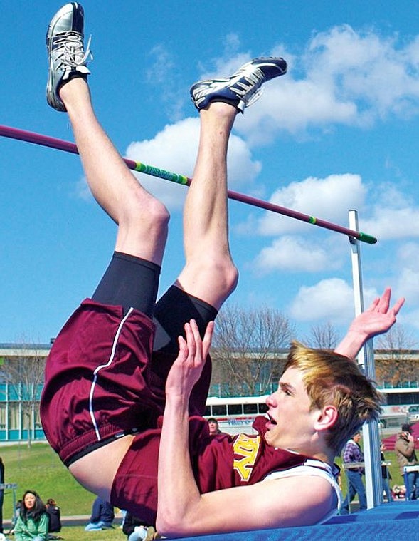 Chris Peterson/Hungry Horse News Ryan Rayson of Troy clears the bar in the high jump on Saturday at the Columbia Falls Invitational.